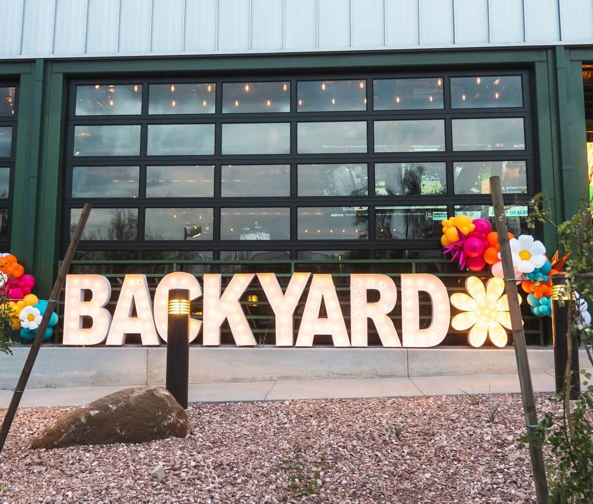 backyard sign at the exterior of the bar